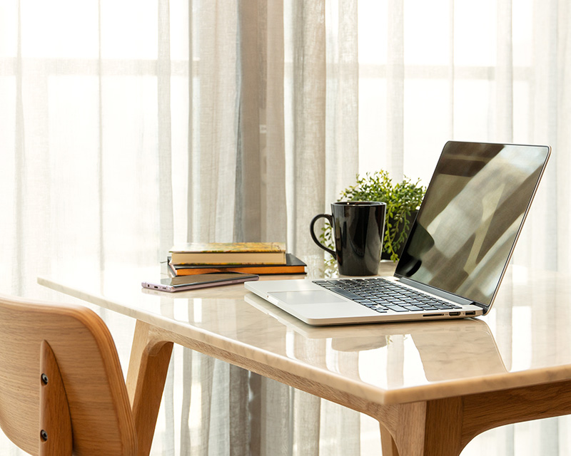 Laptop on a desk for therapy in South Orange County